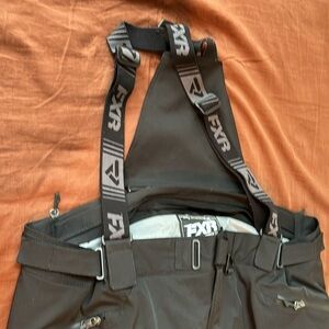 Women’s snowmobile bibs (FXR) size 20, matching jacket listed separately.